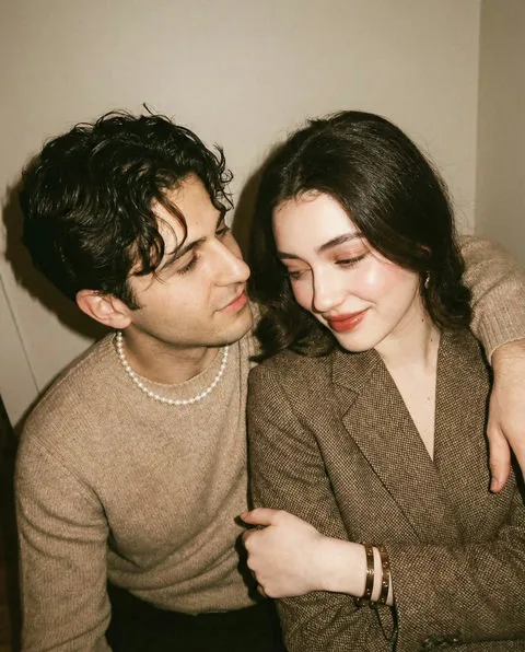 Illustrative adult couple sharing a cozy moment